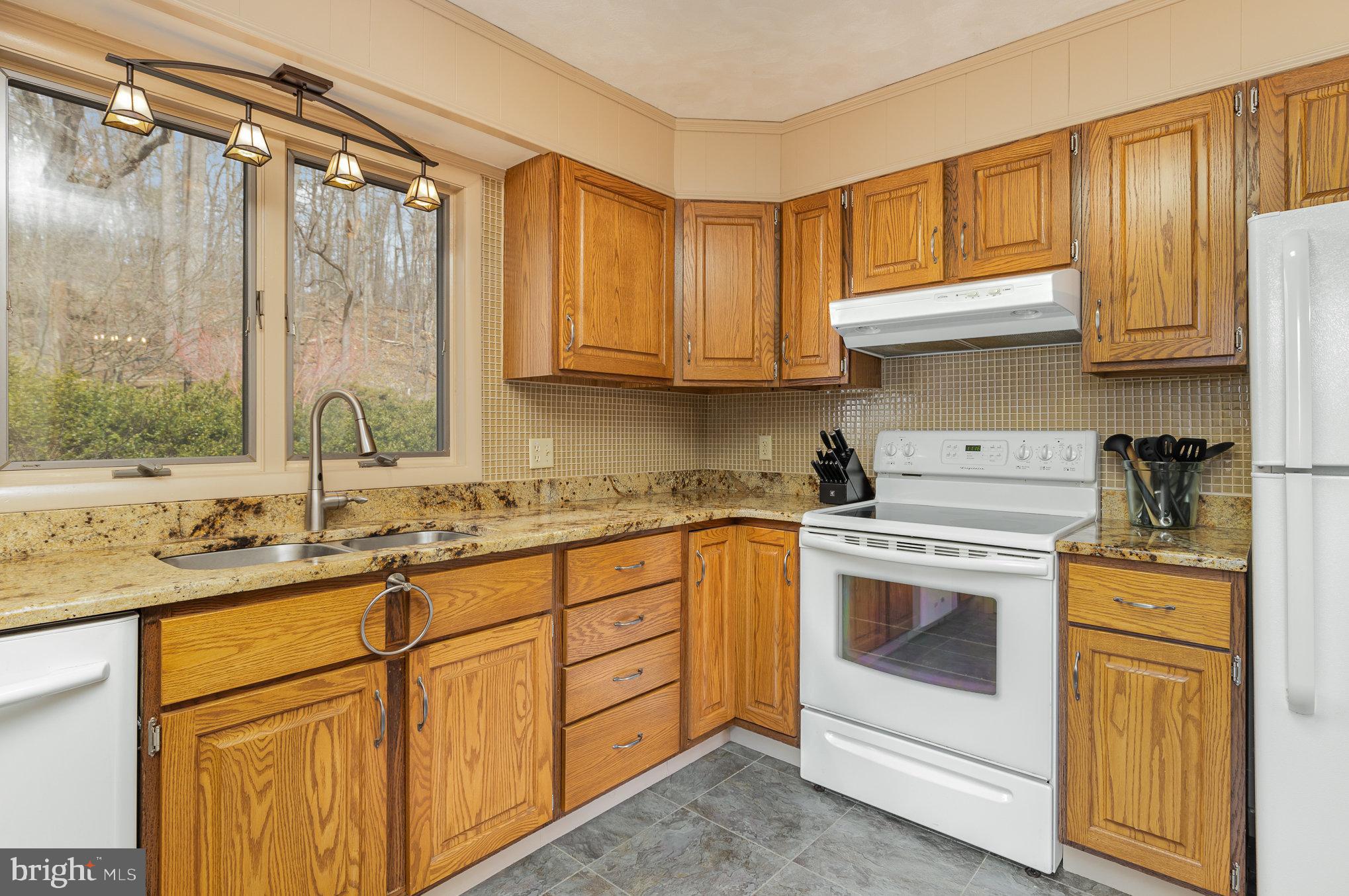 535 Sandy Hollow Road New Bloomfield, PA 17068 - Photo 10 of 51 Granite kitchen and tile floors.