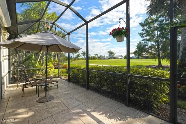 a view of a two chairs with an outdoor space