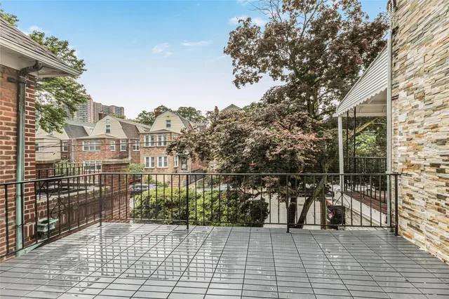 a view of a balcony with city view