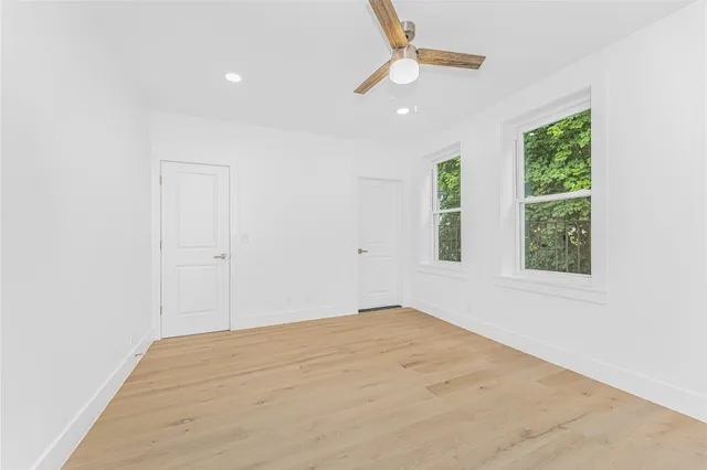 an empty room with windows