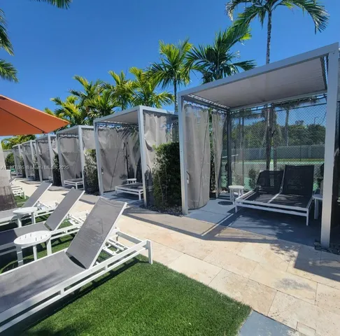 a view of yard with patio