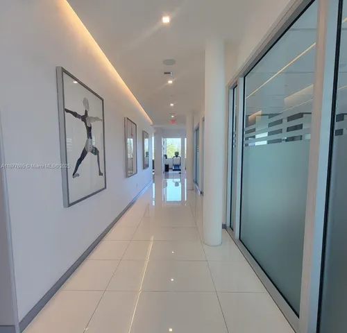 a view of gallery with windows