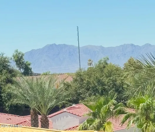 a view of a outdoor space and a mountain view