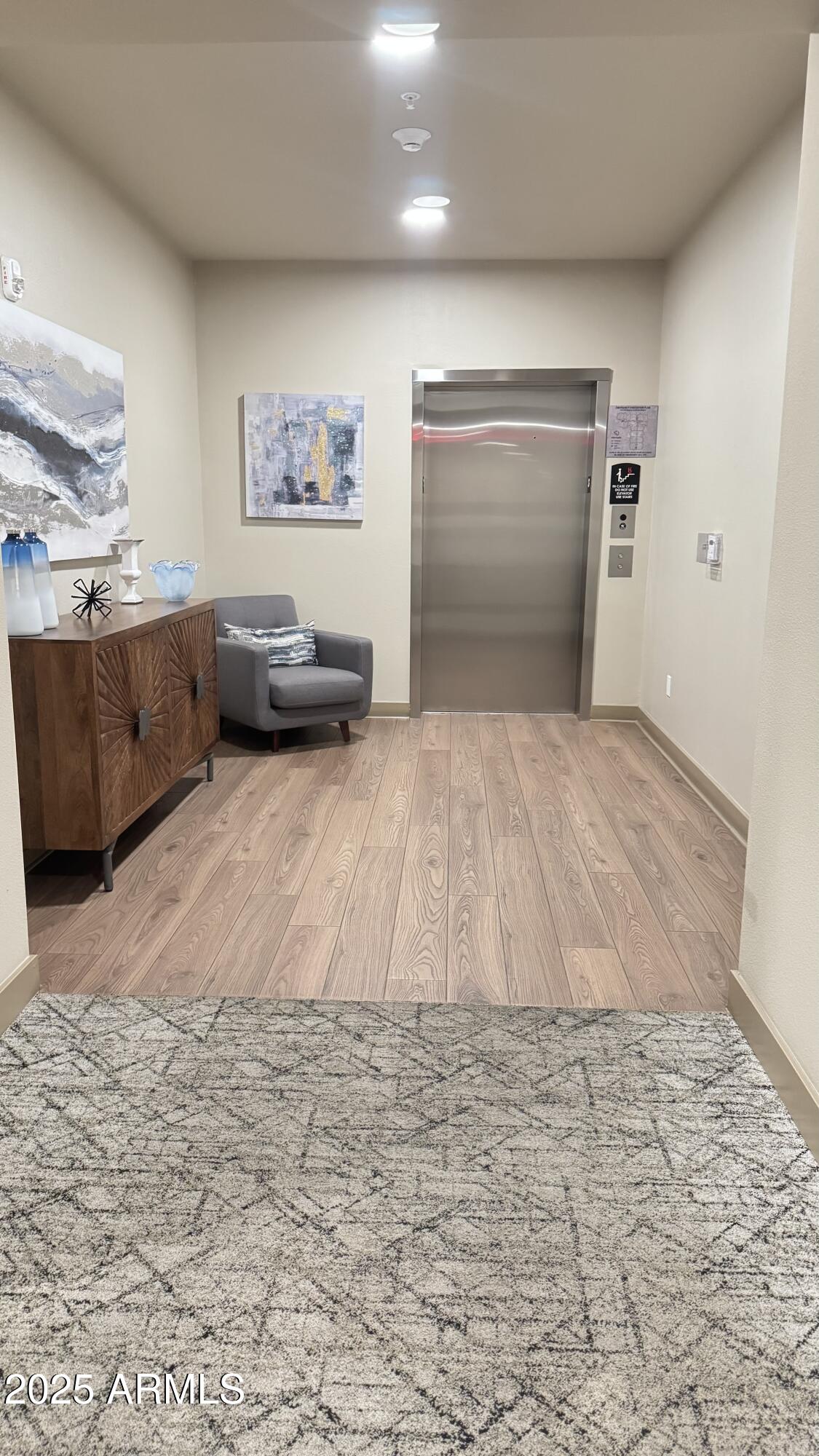 2511 West Queen Creek Road, Unit 377 Chandler, AZ 85248 - Photo 32 of 47 a spacious bedroom with a large bed and a large window