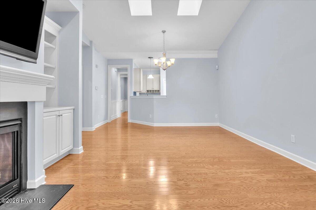 243 Windchime Way Leland, NC 28451 - Photo 16 of 68 Living Room/Dining Room