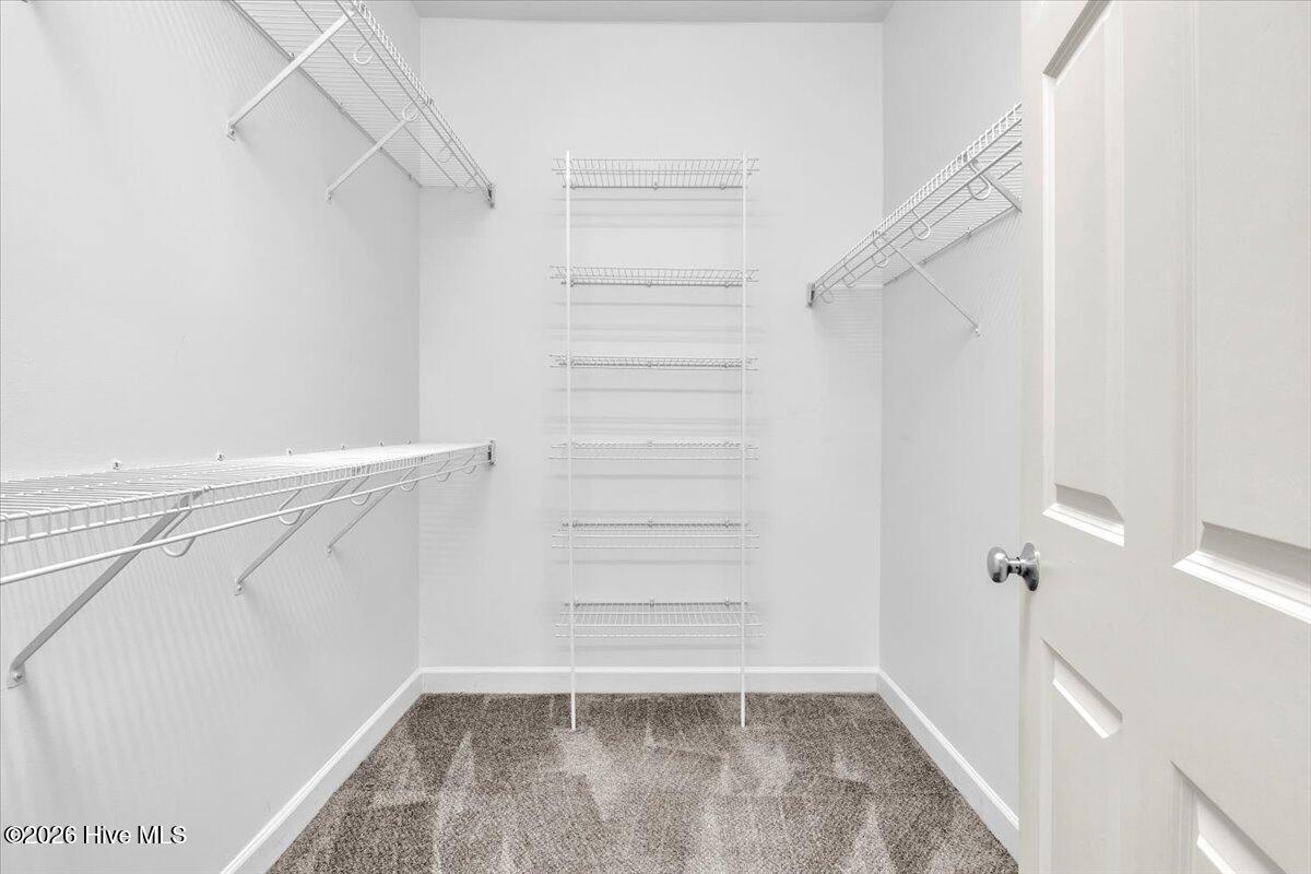 243 Windchime Way Leland, NC 28451 - Photo 29 of 68 Primary Bedroom Closet