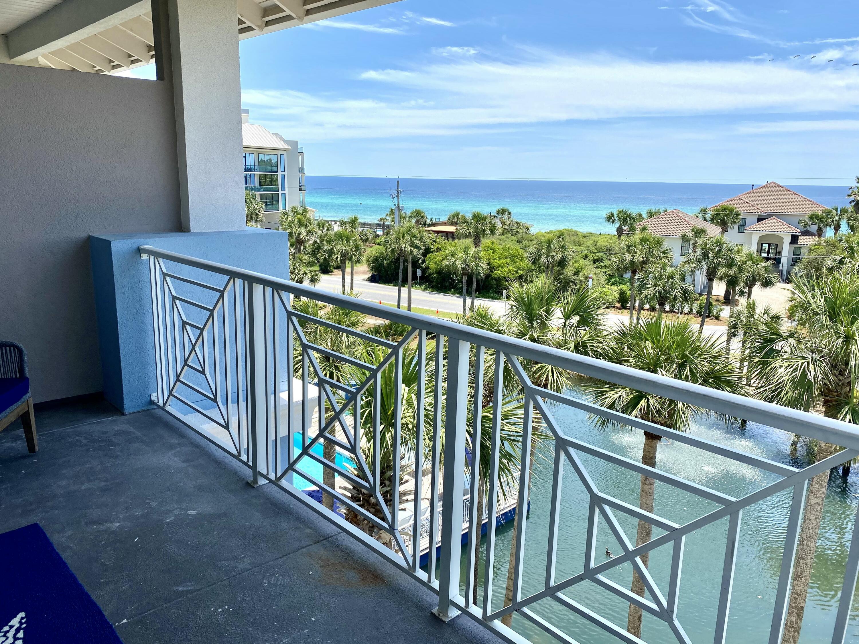 145 Spires Lane, Unit 411 Santa Rosa Beach, FL 32459 - Photo 1 of 44 a view of a balcony with an outdoor space