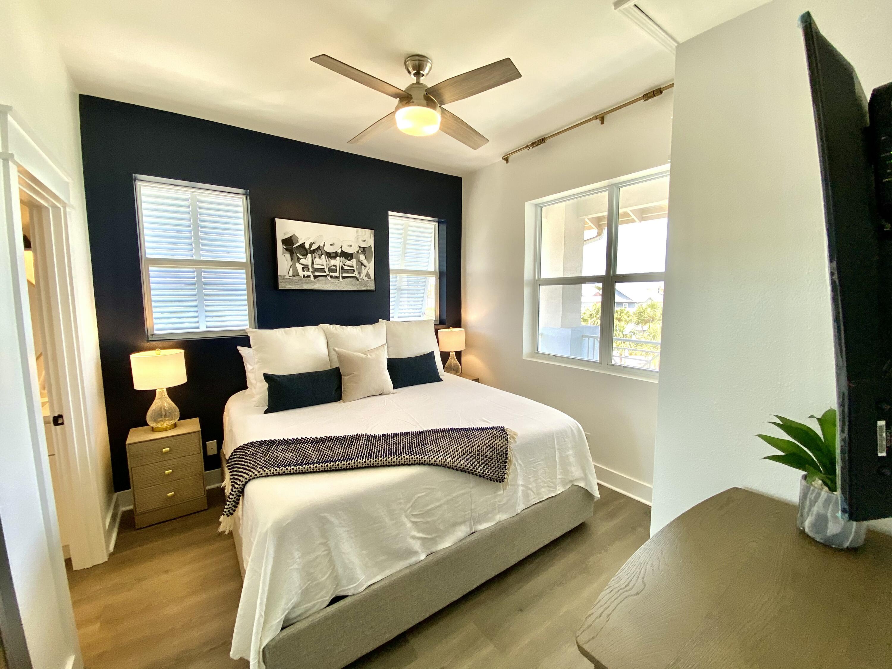 145 Spires Lane, Unit 411 Santa Rosa Beach, FL 32459 - Photo 19 of 44 a bedroom with bed and window