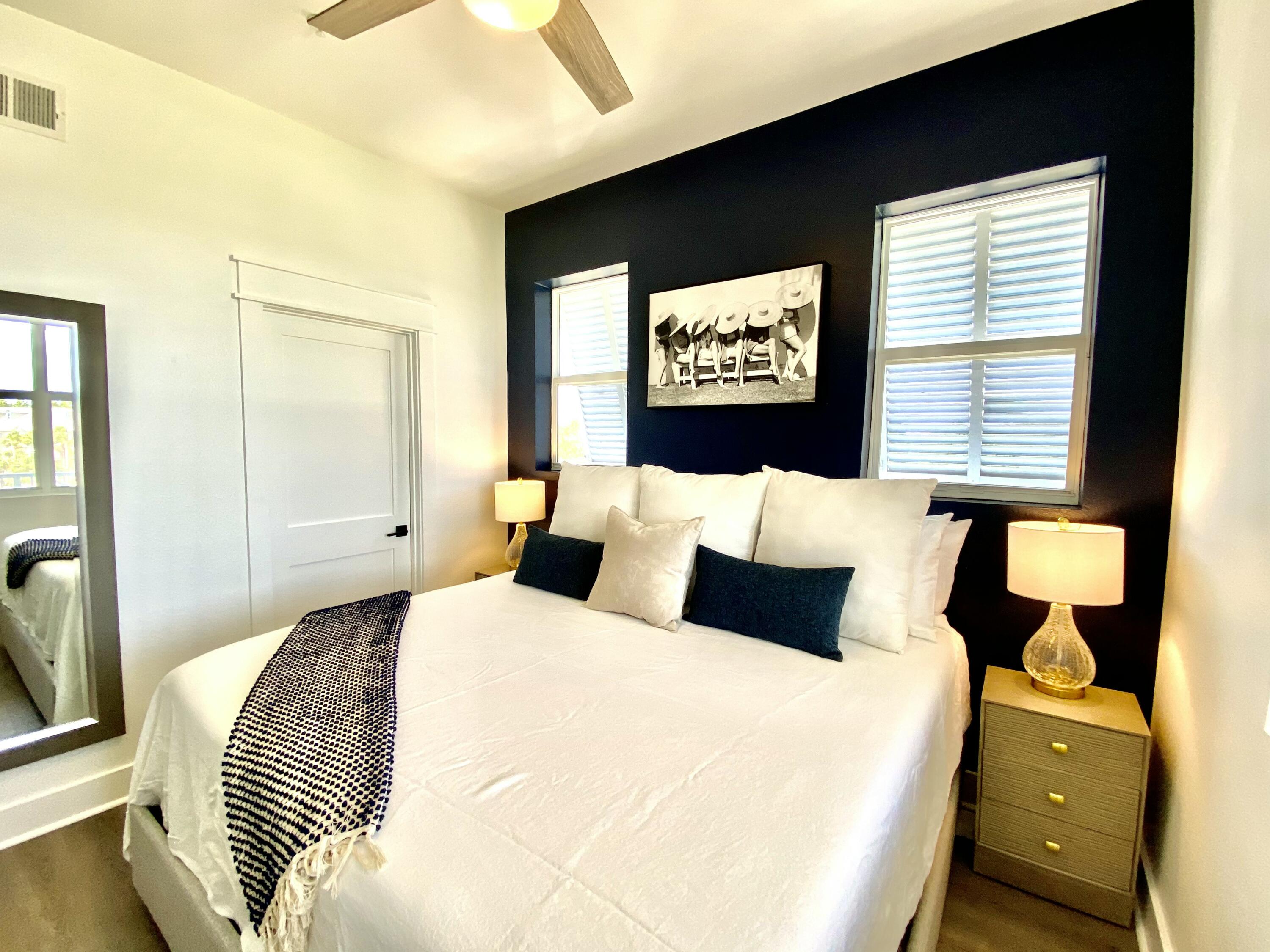 145 Spires Lane, Unit 411 Santa Rosa Beach, FL 32459 - Photo 21 of 44 a bedroom with bed and window