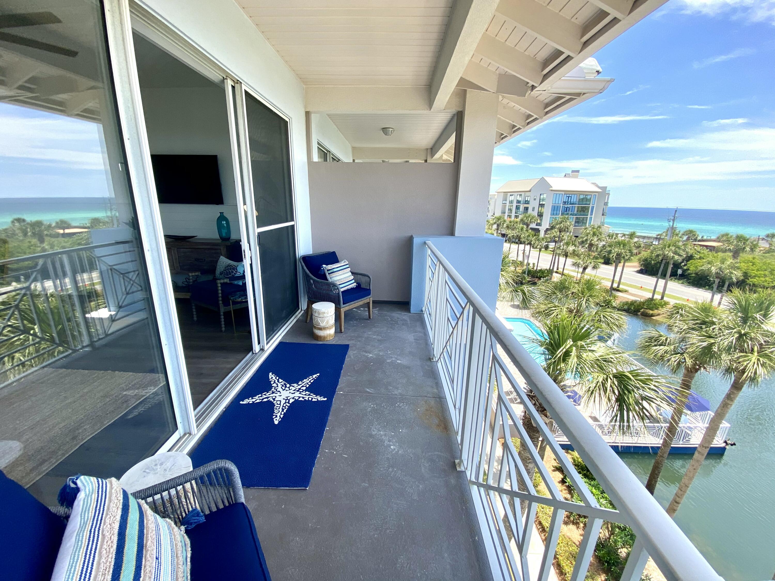145 Spires Lane, Unit 411 Santa Rosa Beach, FL 32459 - Photo 7 of 44 a balcony with view of living room