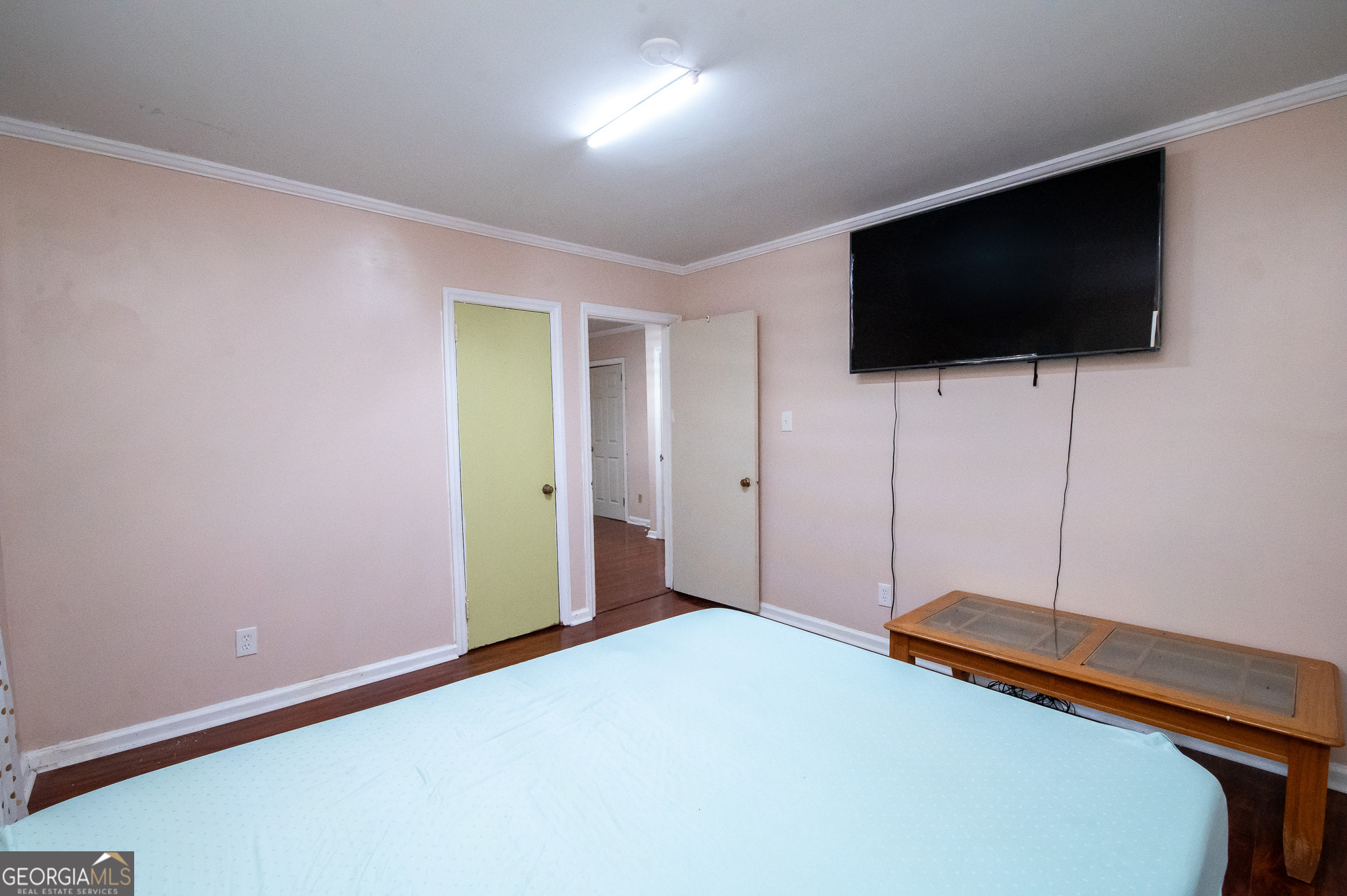 2032 Vining Circle Macon, GA 31204 - Photo 26 of 43 a bedroom with a bed and a flat screen tv