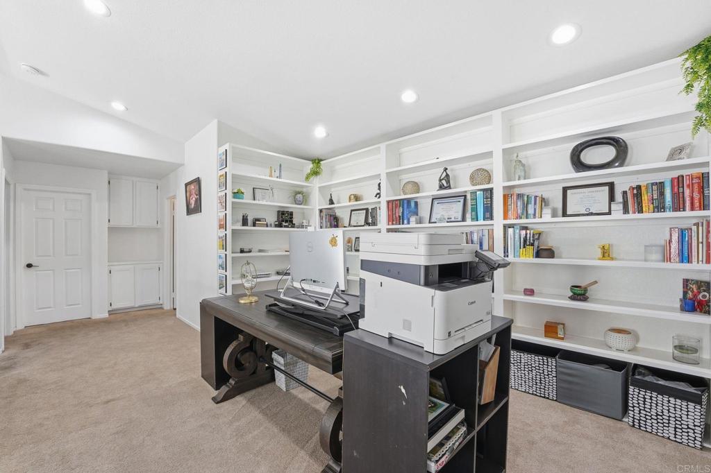 2505 Whispering Palms Loop Chula Vista, CA 91915 - Photo 18 of 45 a room with furniture a washer and dryer