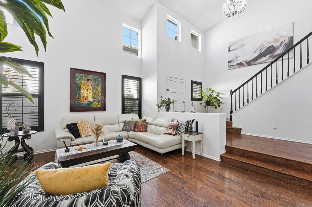 2505 Whispering Palms Loop Chula Vista, CA 91915 - Photo 4 of 45 a living room with furniture and a large window