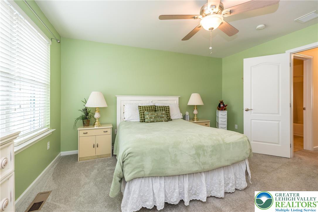 3540 Lenape Lane Emmaus, PA 18049 - Photo 18 of 29 Bedroom 2 with ceiling fan/light combo and walk-in closet