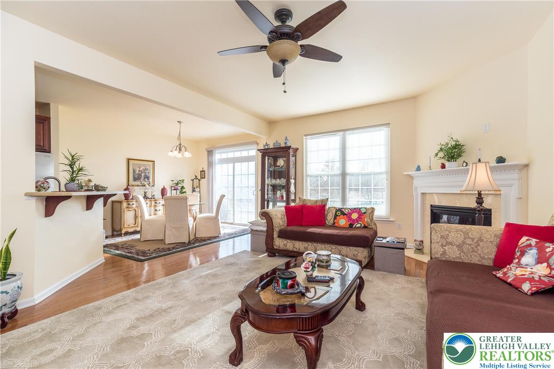 3540 Lenape Lane Emmaus, PA 18049 - Photo 3 of 29 Great room with ceiling fan/light combo and gas fireplace