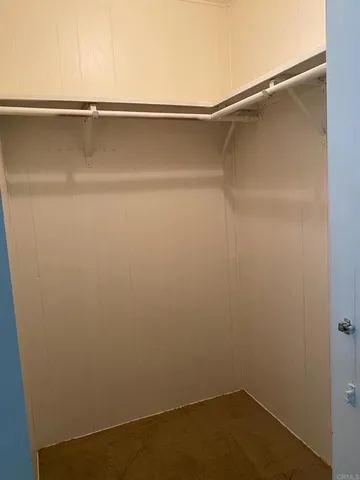 a view of small space with racks on the wall