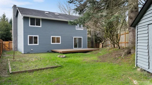 a brick house with a yard