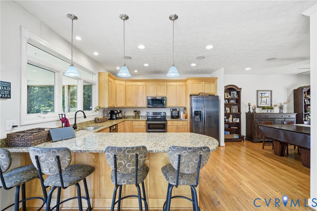 210 Riverview Road Stevensville, VA 23161 - Photo 17 of 63 Open-concept kitchen featuring light wood cabinetr