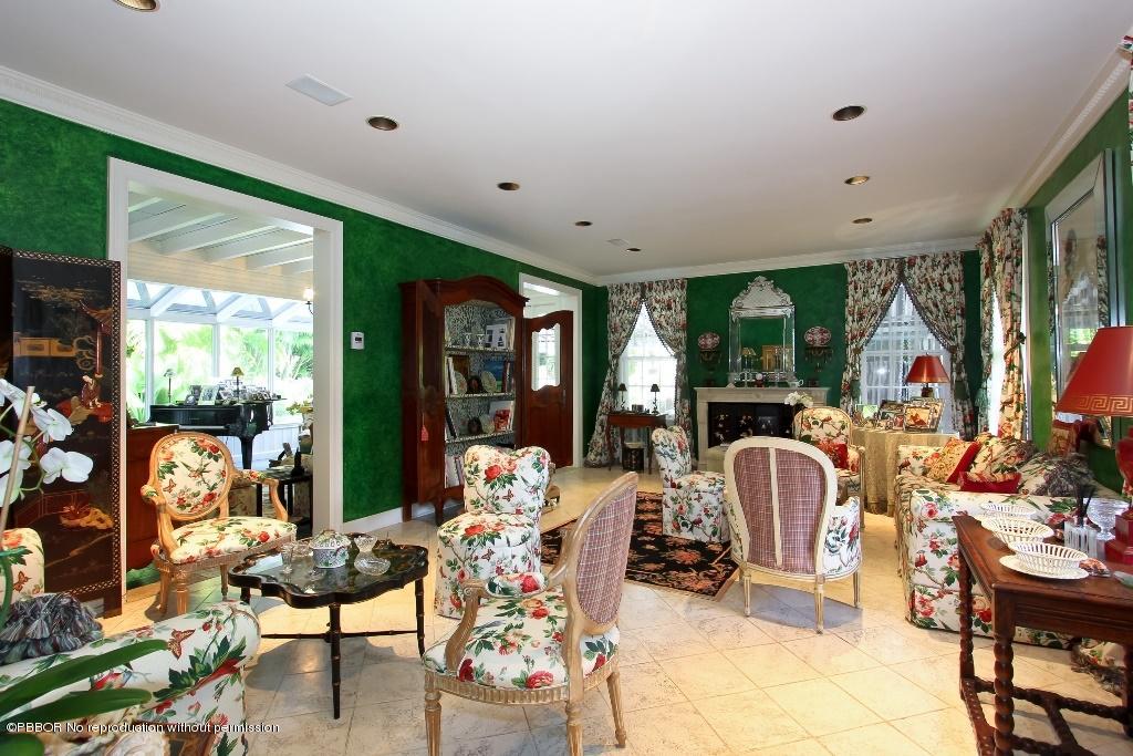 275 Monterey Road Palm Beach, FL 33480 - Photo 3 of 9 a view of a livingroom with furniture and floor to ceiling window