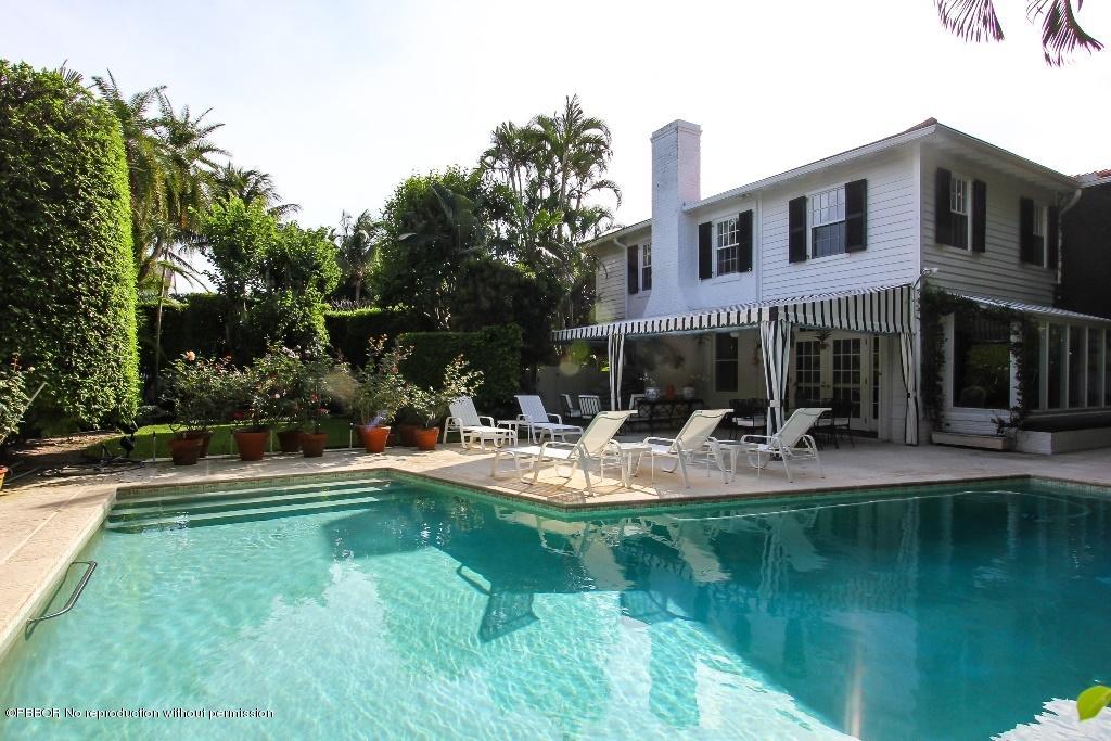 275 Monterey Road Palm Beach, FL 33480 - Photo 9 of 9 a view of a house with swimming pool and sitting area