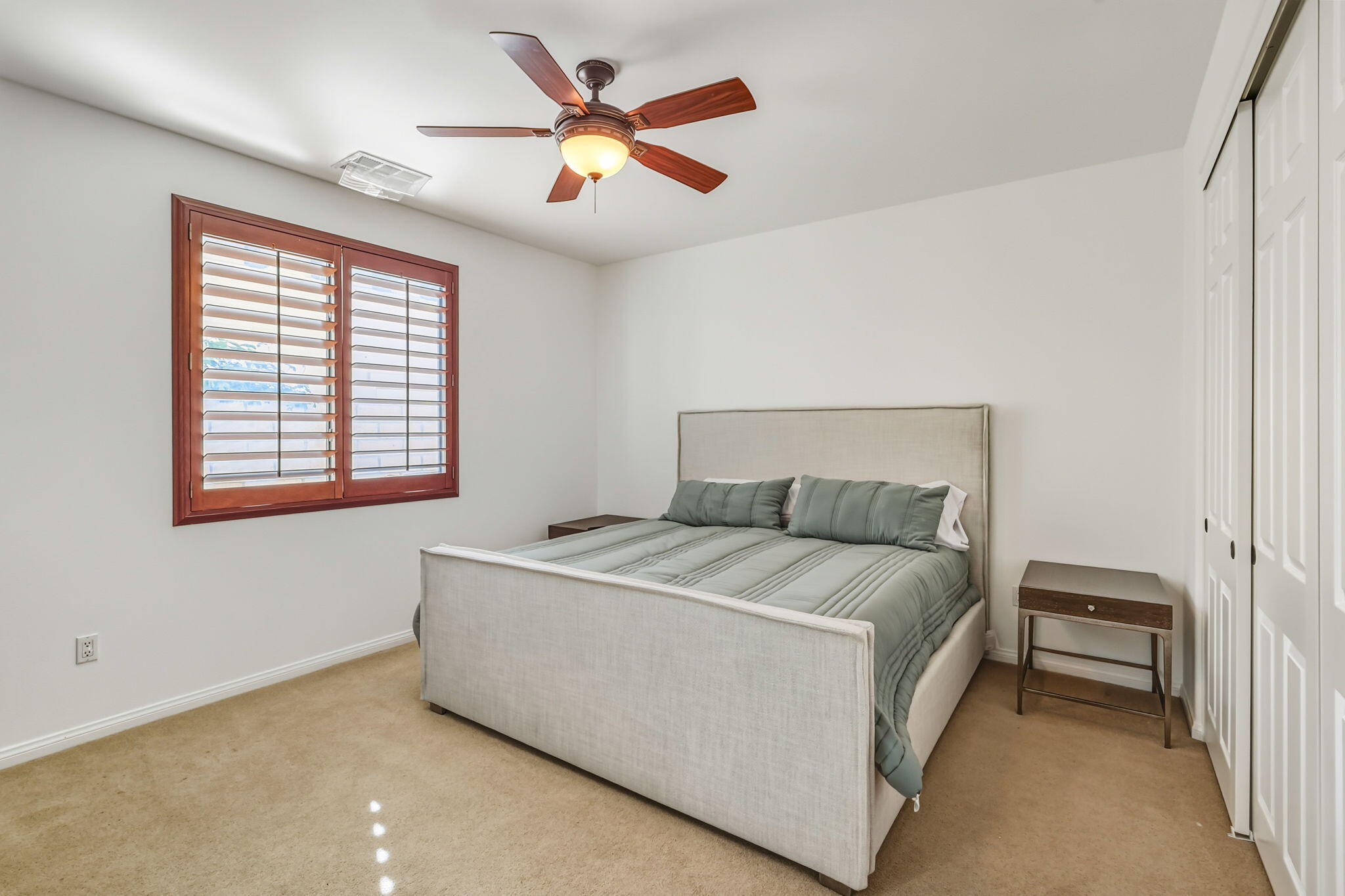 57914 Santa Rosa Trail La Quinta, CA 92253 - Photo 14 of 14 a bedroom with a bed and a ceiling fan