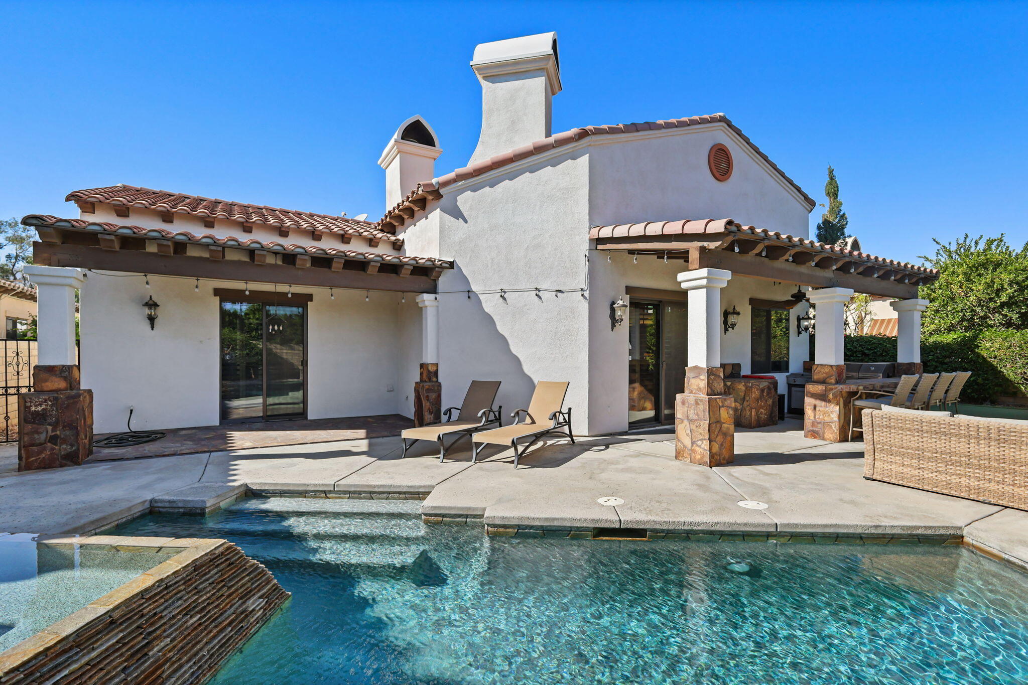 57914 Santa Rosa Trail La Quinta, CA 92253 - Photo 4 of 14 a view of house with backyard and outdoor seating