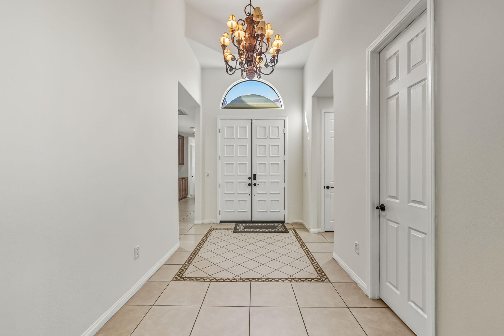 57914 Santa Rosa Trail La Quinta, CA 92253 - Photo 5 of 14 a view of a hallway with front door