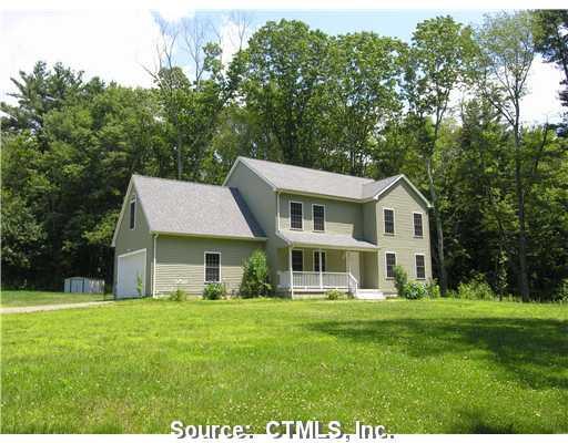 331 North Society Road Canterbury, CT 06331 - Photo 1 of 1 a front view of a house with a yard