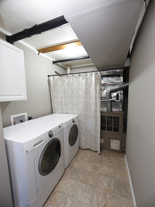 7209 Fiesta Way Raleigh, NC 27615 - Photo 19 of 24 Laundry Room