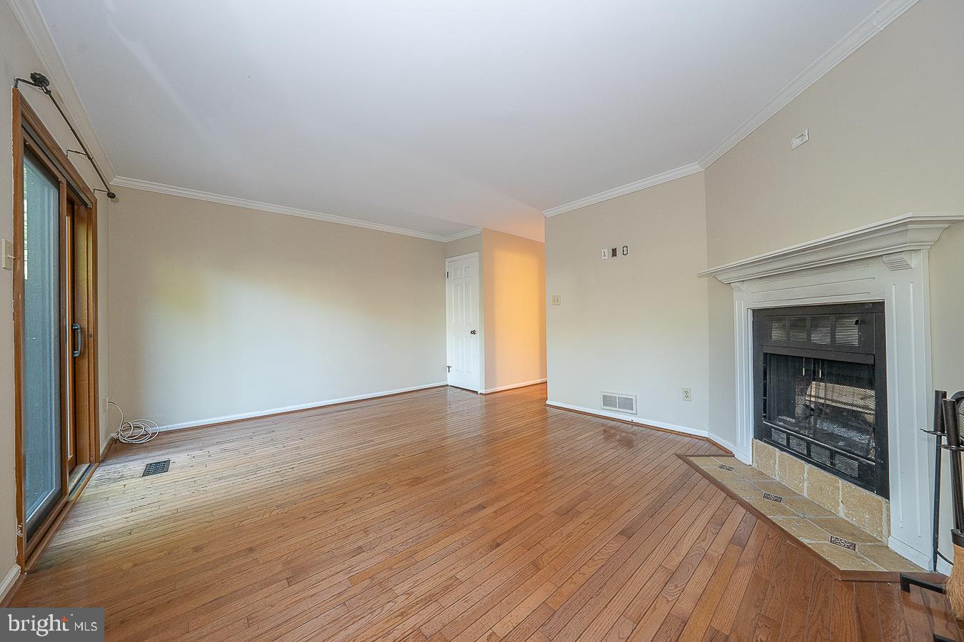 427 Eagle Road, Unit 14 Wayne, PA 19087 - Photo 10 of 21 Living Room w Wood Burning Fireplace