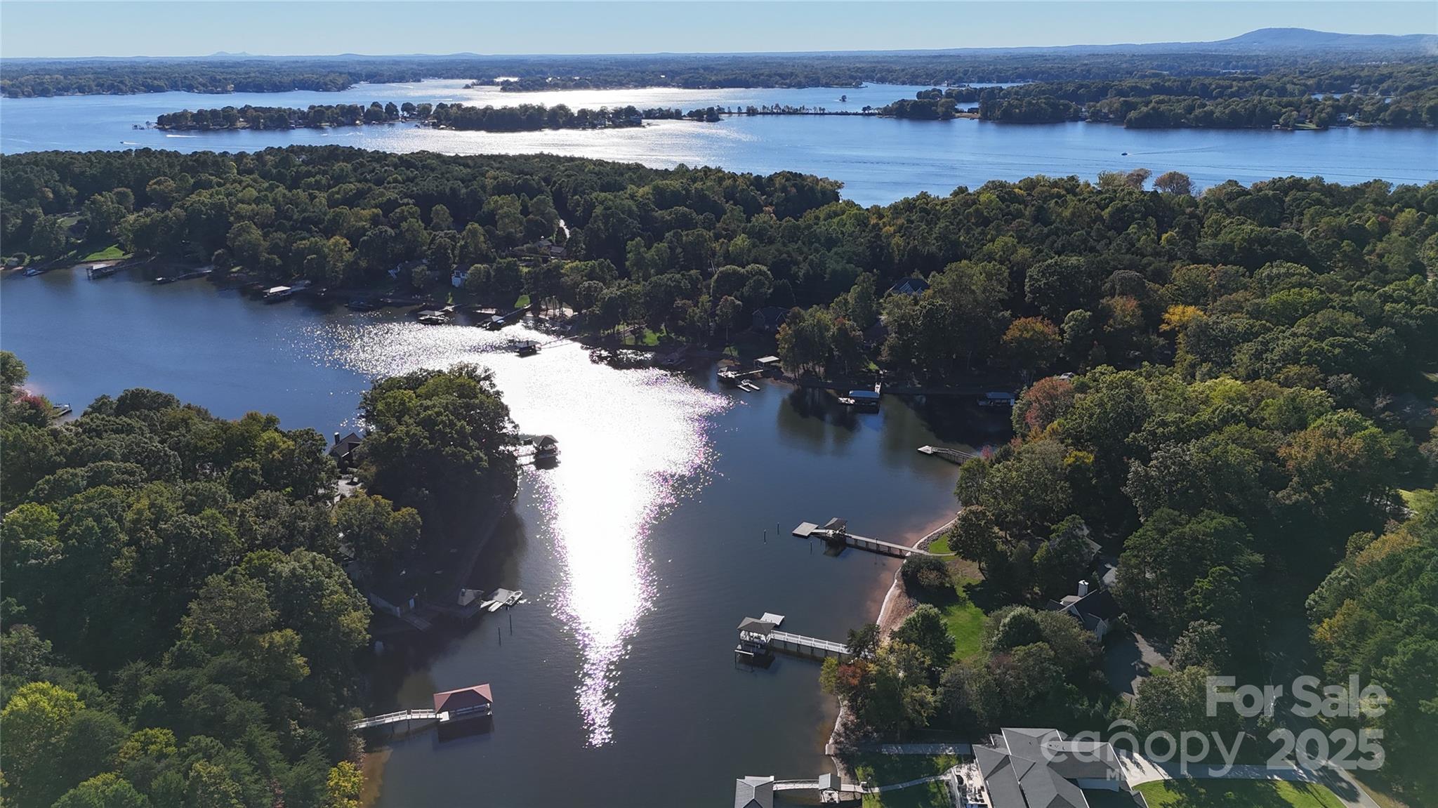 515 Kemp Road Mooresville, NC 28117 - Photo 20 of 24 an aerial view of lake with residential houses with outdoor space