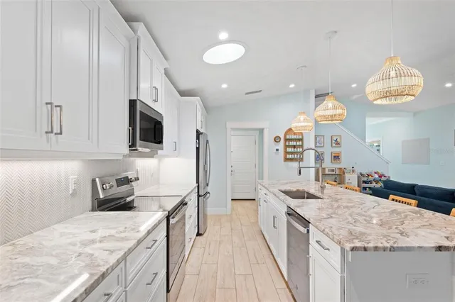a view of storage and utility room with washer and dryer