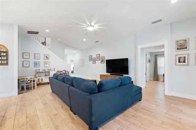 a bedroom with a bed and a table