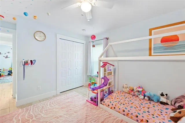 a room with furniture a chandelier and a window