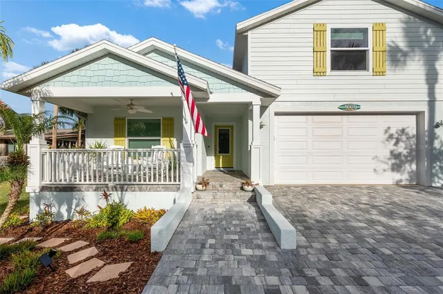 a front view of a house with a porch