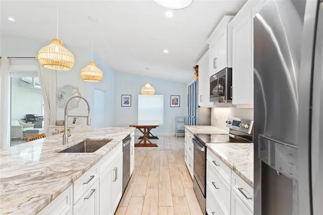 a workspace room with furniture and wooden floor