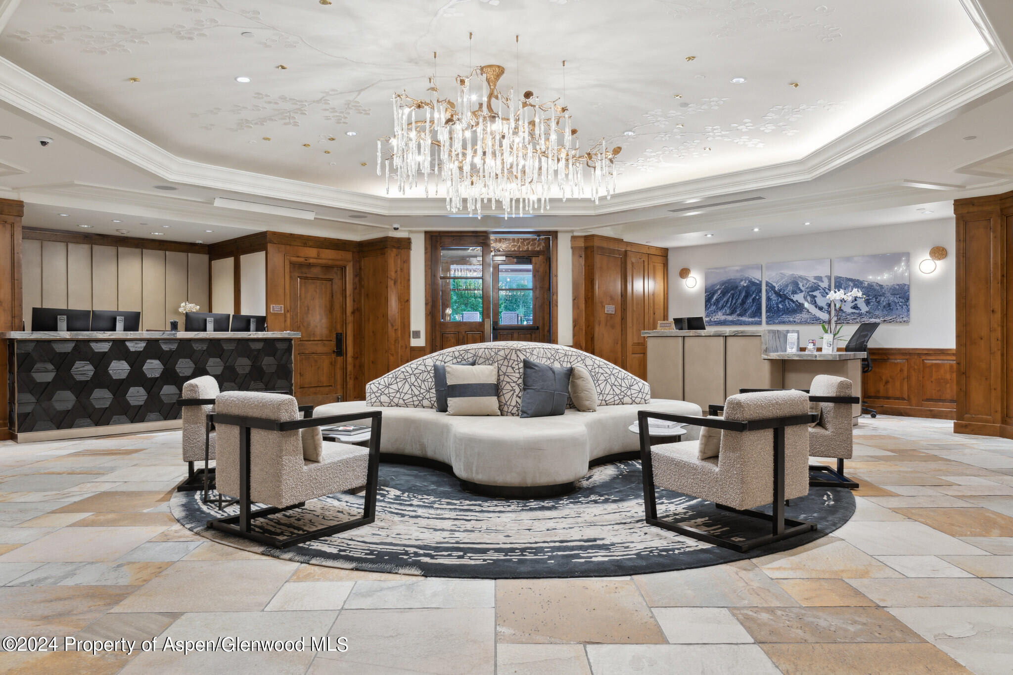415 East Dean St Unit 46 Week 12 Aspen, CO 81611 - Photo 25 of 27 a living room with furniture and a chandelier