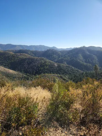 a view of lake with mountain