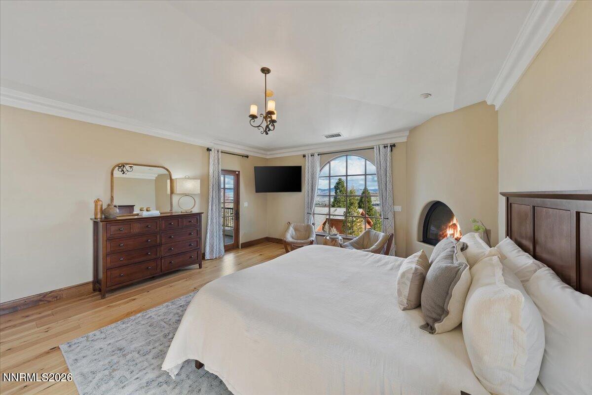 4400 Slide Mountain Circle Reno, NV 89511 - Photo 39 of 93 a bedroom with a bed and a dresser