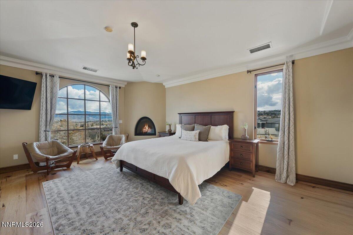 4400 Slide Mountain Circle Reno, NV 89511 - Photo 45 of 79 a bedroom with a bed and window