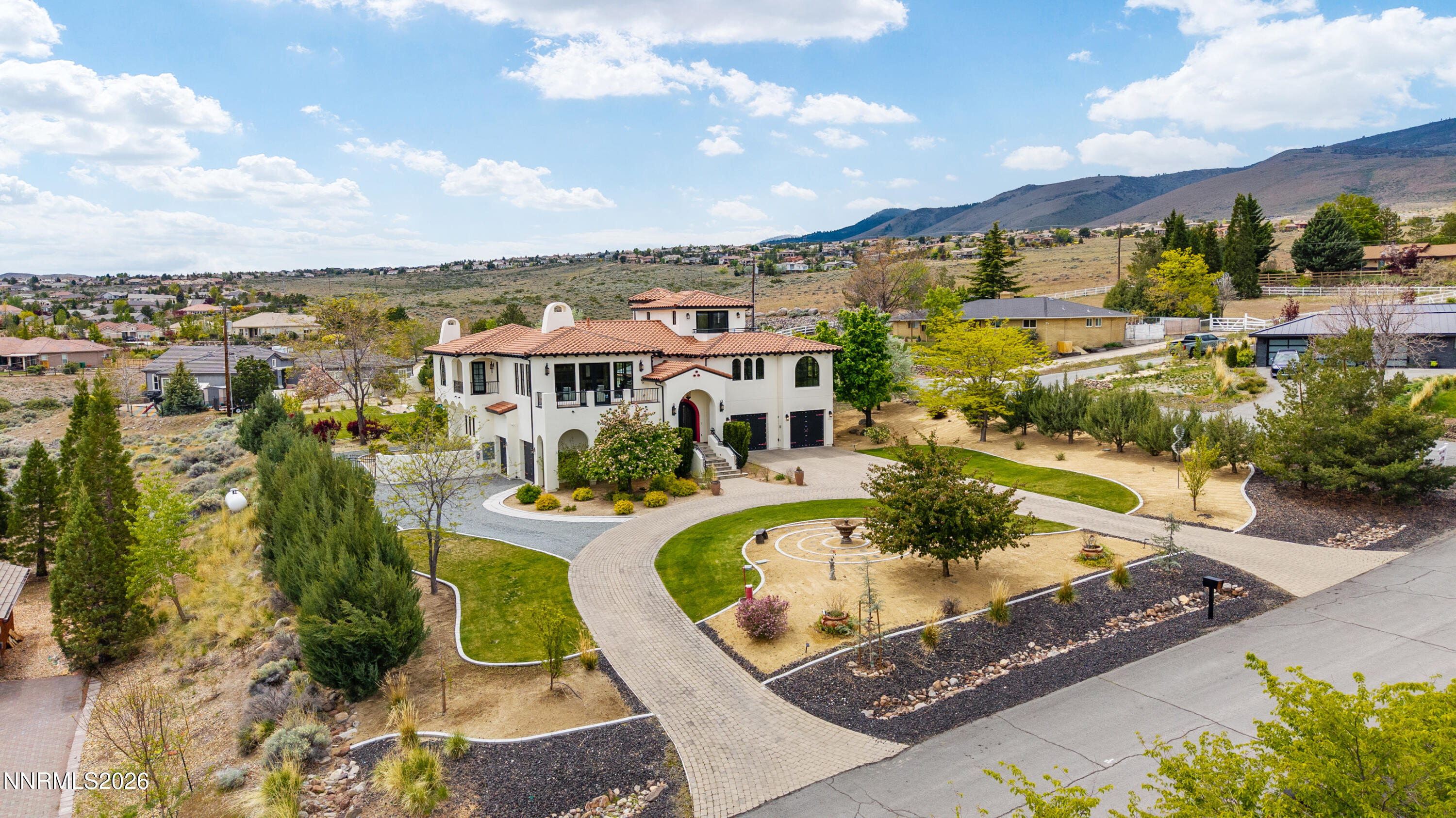 4400 Slide Mountain Circle Reno, NV 89511 - Photo 5 of 79 an aerial view of residential houses with outdoor space and swimming pool