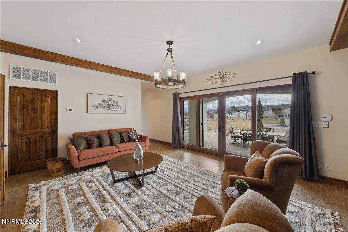 4400 Slide Mountain Circle Reno, NV 89511 - Photo 52 of 93 a living room with furniture and a large window