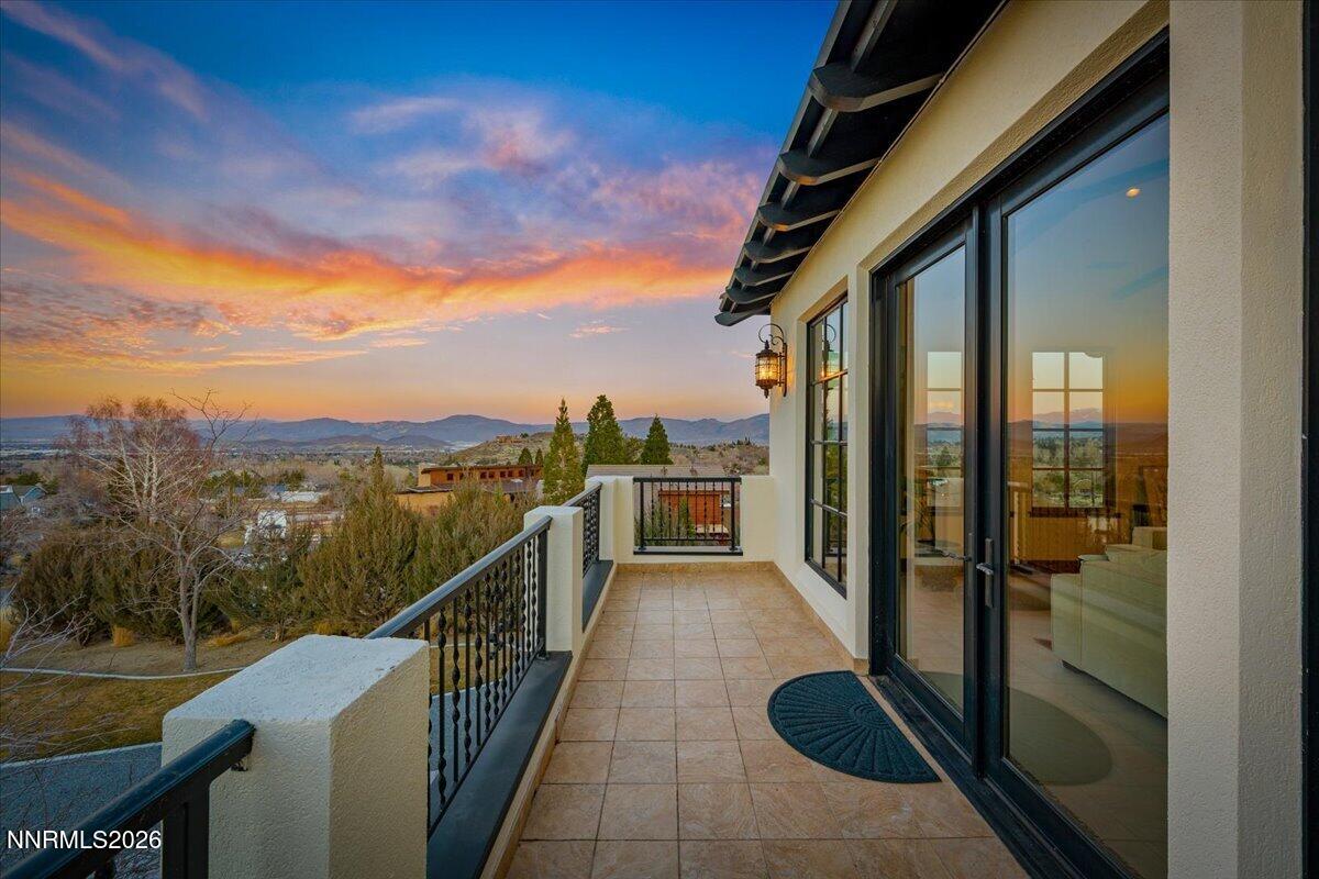 4400 Slide Mountain Circle Reno, NV 89511 - Photo 6 of 93 a view of a balcony with furniture and city view