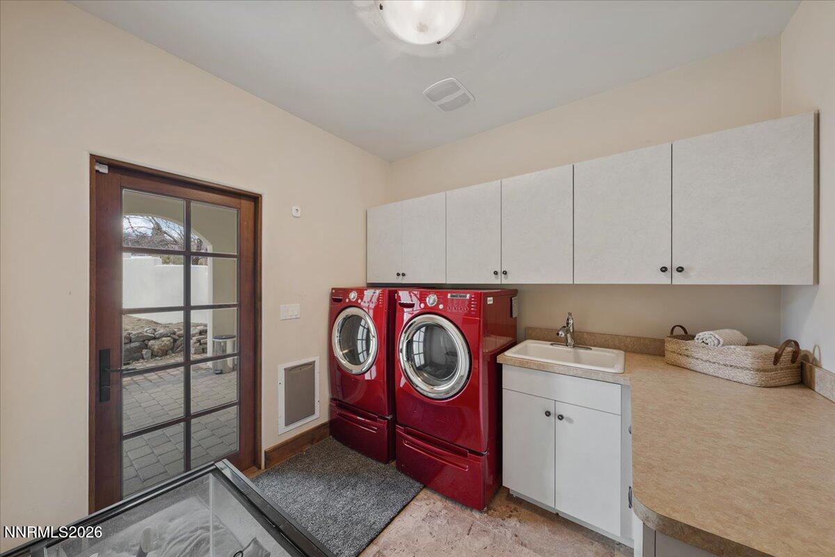 4400 Slide Mountain Circle Reno, NV 89511 - Photo 70 of 93 a utility room with sink dryer and washer