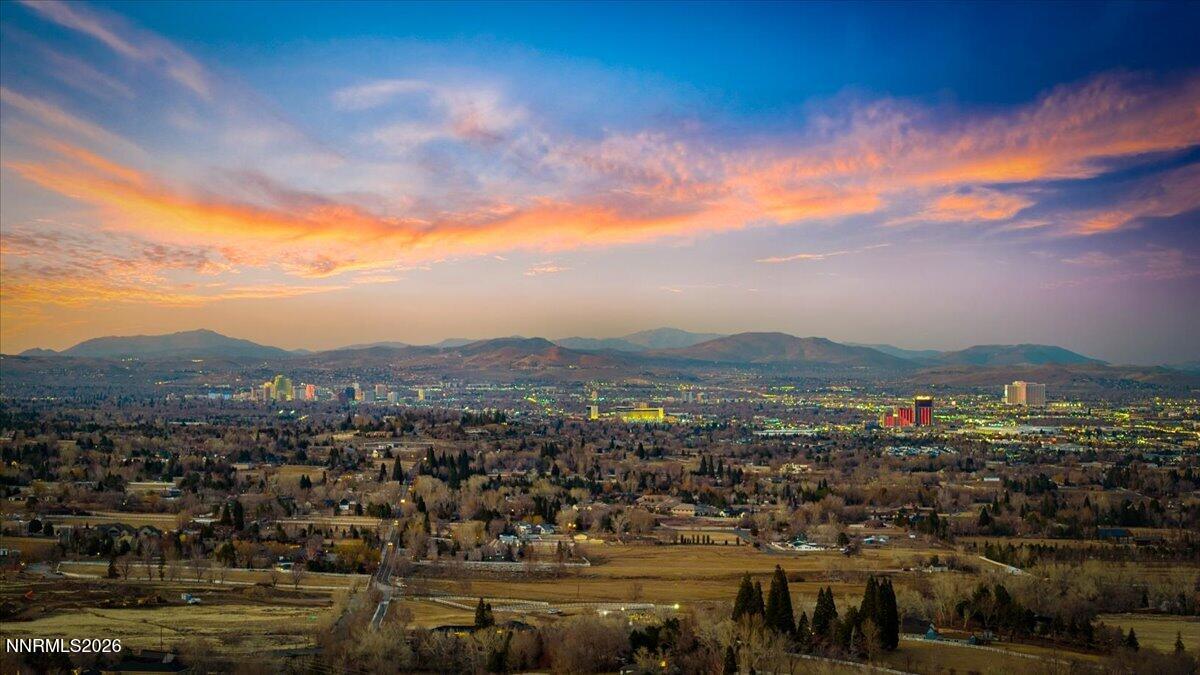 4400 Slide Mountain Circle Reno, NV 89511 - Photo 89 of 93 a view of a city with lots of residential buildings ocean and mountain view in back