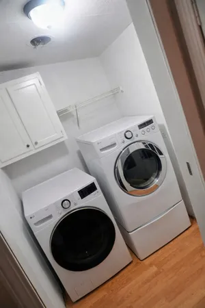 a utility room with dryer and washer