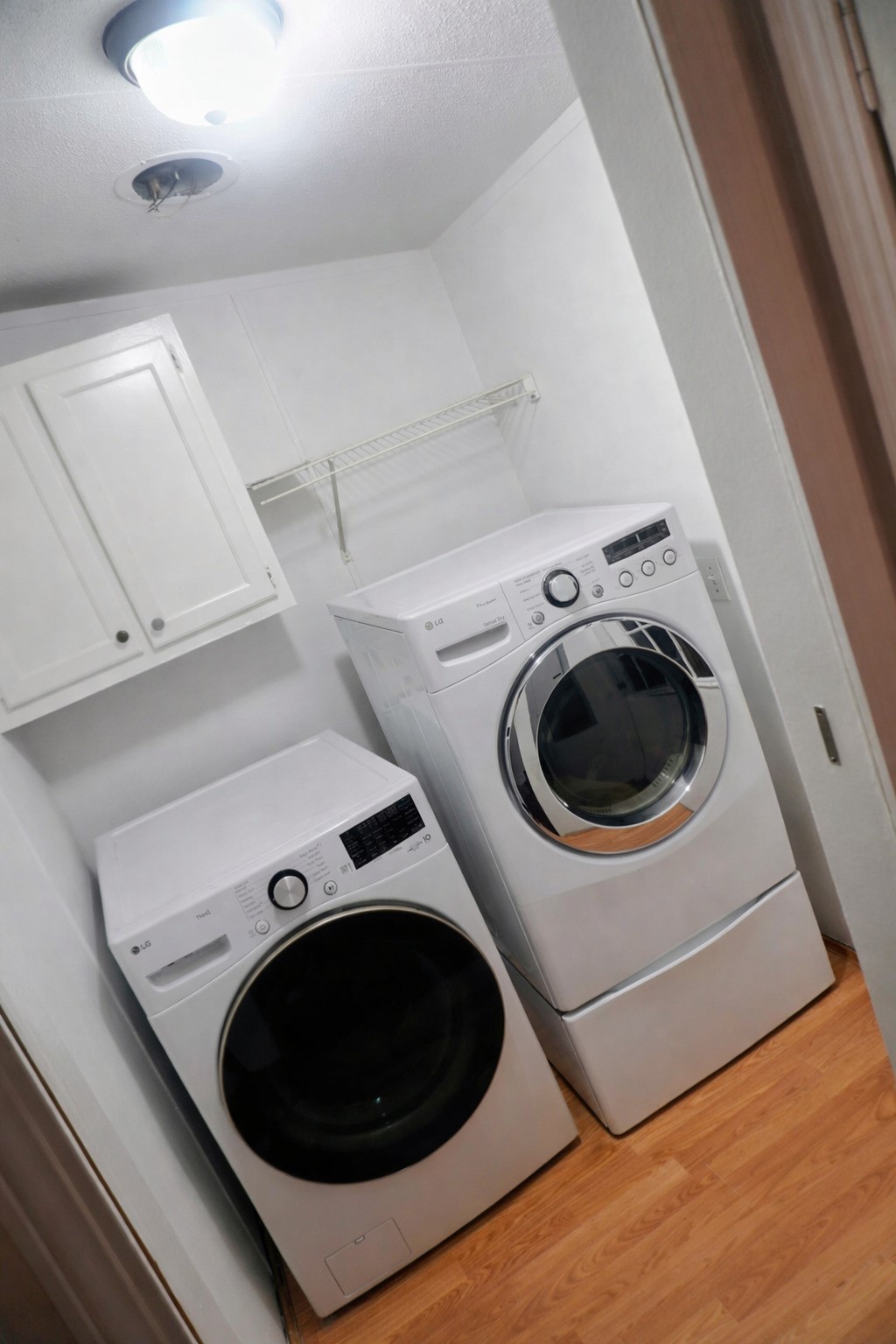 26331 Pinion Creek Road Magnolia, TX 77355 - Photo 6 of 14 a utility room with dryer and washer