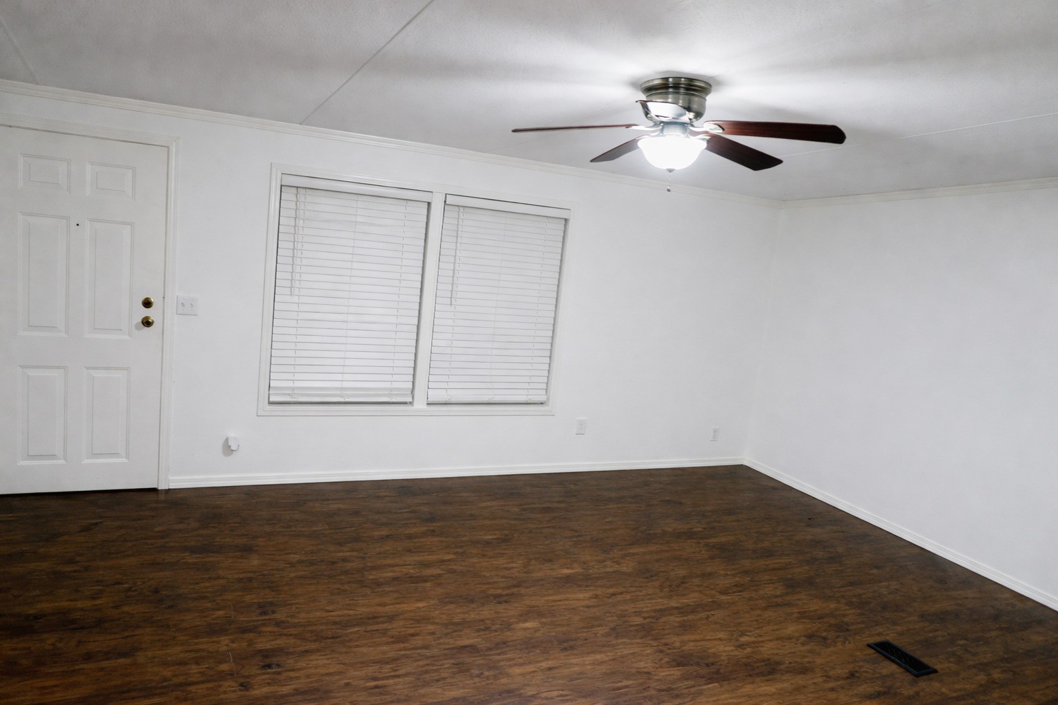 26331 Pinion Creek Road Magnolia, TX 77355 - Photo 8 of 14 a view of an empty room with wooden floor