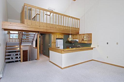 931 Singletree Road, Unit 17 Edwards, CO 81632 - Photo 5 of 11 a living room with furniture and a table