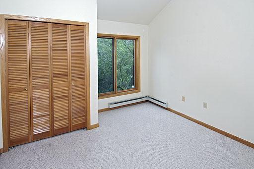 931 Singletree Road, Unit 17 Edwards, CO 81632 - Photo 9 of 11 an empty room with windows